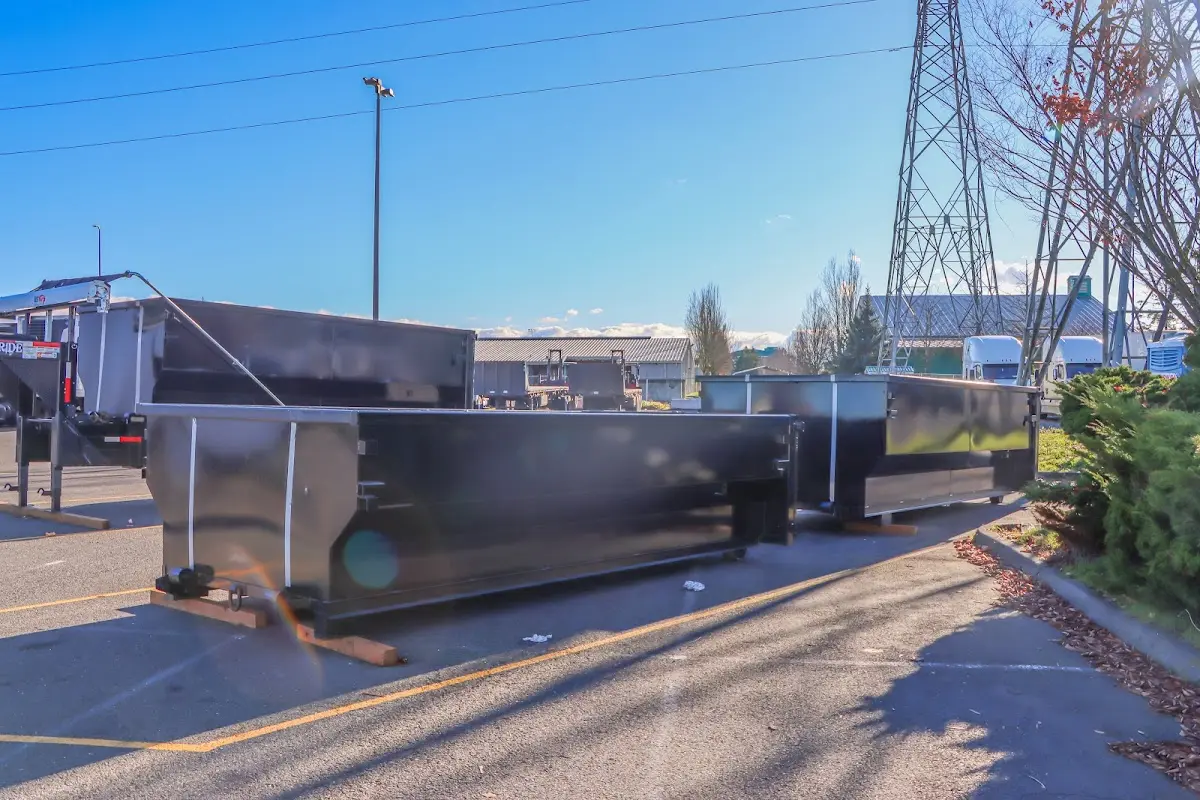 Roll-off dumpster ready for waste disposal at job site for Construction Dumpster Rental in Windsor Heights